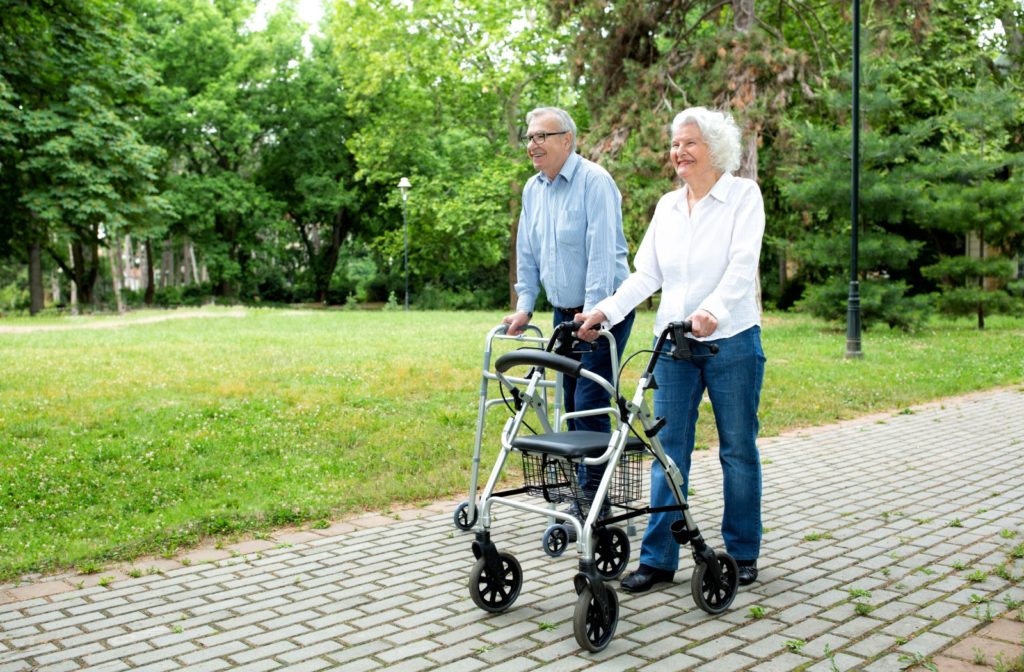 Two seniors walking together as part of their daily physical and cognitive exercise routine.